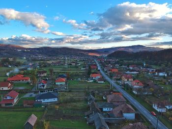 Aerial view of town against sky