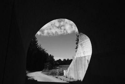 Arch bridge against sky