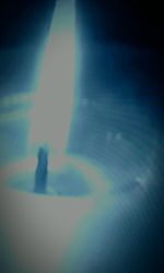 Close-up of illuminated water against sky