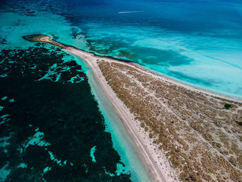 High angle view of surf on beach