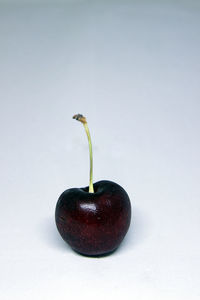 Close-up of strawberry over white background