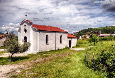 Church on land against sky