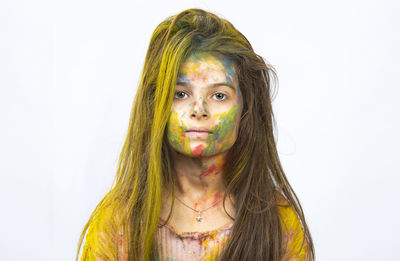 Girl's face and holi colors