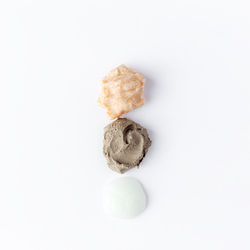 High angle view of bread on white background