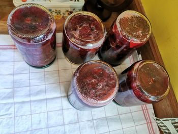 High angle view of fruits in jar on table