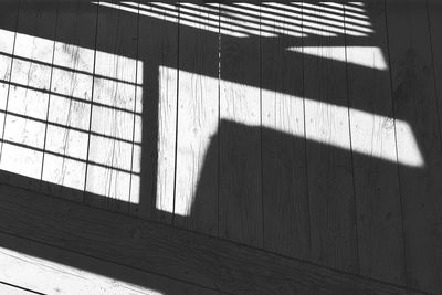 Shadow of window on wood