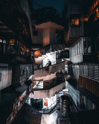 High angle view of illuminated buildings at night