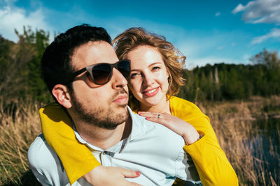 Portrait of smiling young couple