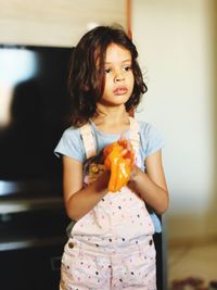 Cute girl holding ice cream