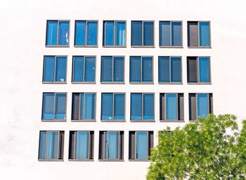 Low angle view of building against blue sky