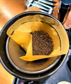 High angle view of coffees dripping on table