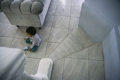 High angle view of people sitting on floor