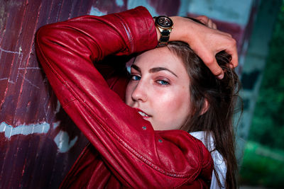 Portrait of a young woman with red eyes