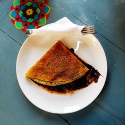 High angle view of cake in plate on table