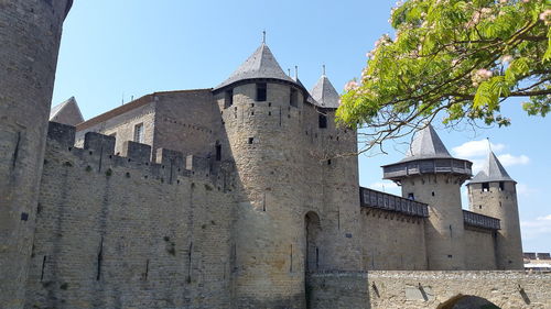 Low angle view of historic building against sky