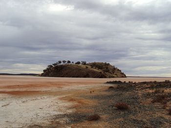 Scenic view of sea against cloudy sky