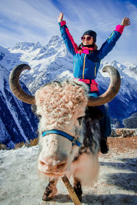 Man with arms raised