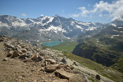 Scenic view of snowcapped mountains against sky