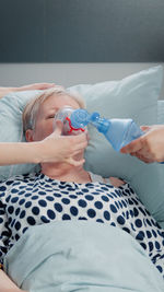 Young woman sleeping on bed at home