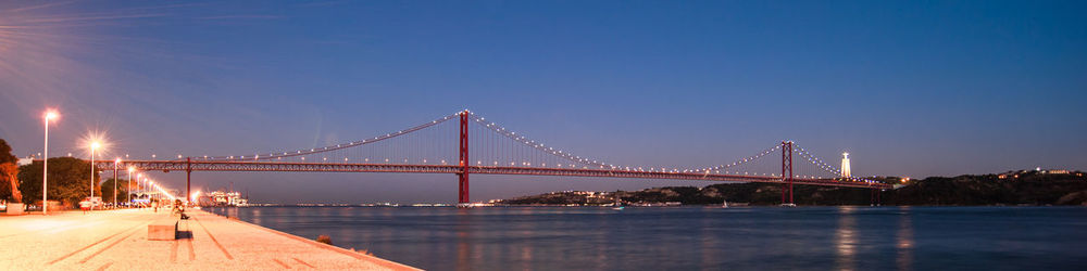 View of suspension bridge at night