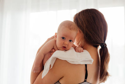 Mother with baby at home