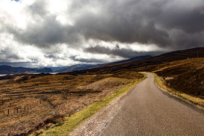 Panoramic view of road along landscape against sky
