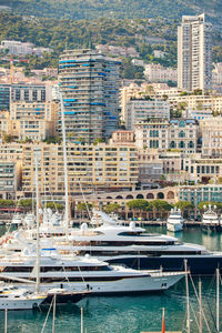 Boats moored at harbor