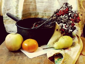 Close-up of fruits in bowl on table