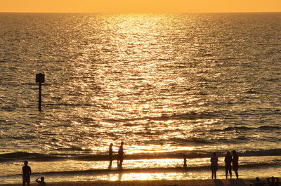 Scenic view of sea at sunset