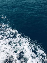 Scenic view of sea against blue sky