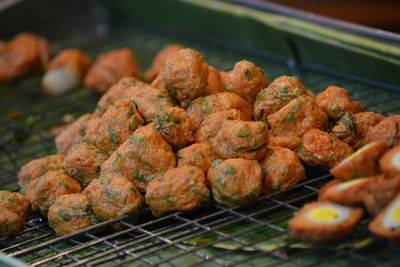 Close-up of meat on barbecue grill