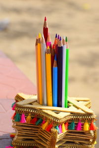 Close-up of multi colored pencils on table