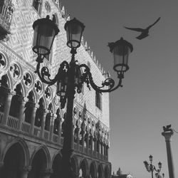 Low angle view of street light against sky