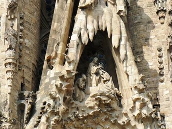 Low angle view of statue against temple