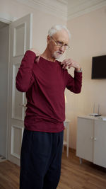 Senior man exercising at nursing home