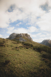 Scenic view of landscape and mountains against sky