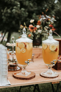 Close-up of drink containers on table