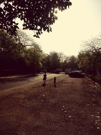 People on road against sky