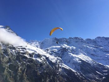 Scenic view of snowcapped mountain against sky