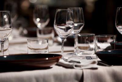 Drinking glasses on table in restaurant