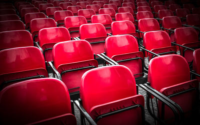 Full frame shot of empty red chairs