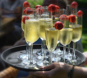 Close-up of wine glasses on table