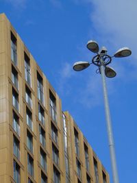 Low angle view of building against clear blue sky