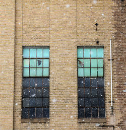 Full frame shot of window on wall of building