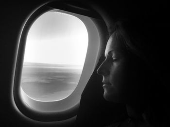 Close-up of airplane seen through window