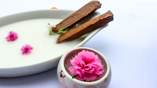 High angle view of pink flowers on table