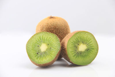 Close-up of fruits against white background