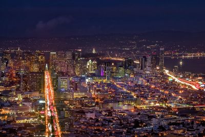 High angle view of illuminated cityscape at night