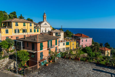 Village of pieve ligure with its church on the italian riviera