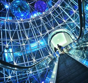 Low angle view of illuminated ceiling